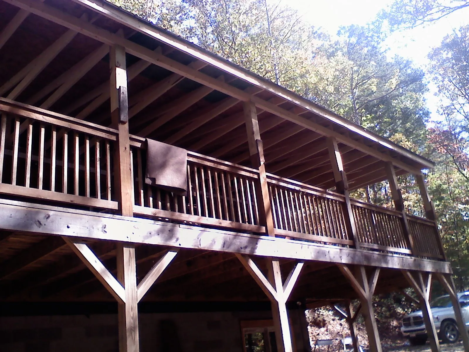 Timber framing under a new elevated porch and deck — Roof Leak Repair in Society Hill by Roofing Brothers